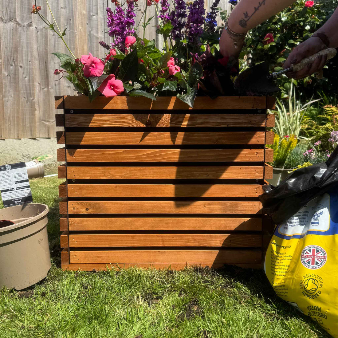 The Square Sussex wooden planter in brown, solid timber, built in the Trelush Kent workshop
