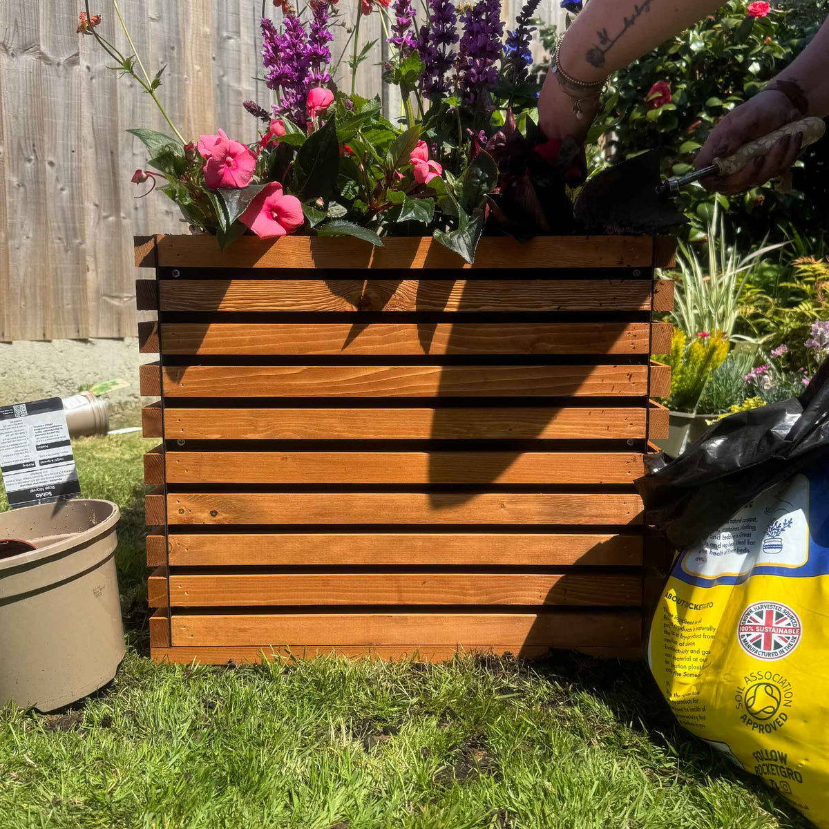 The Square Sussex wooden planter in brown, solid timber, built in the Trelush Kent workshop